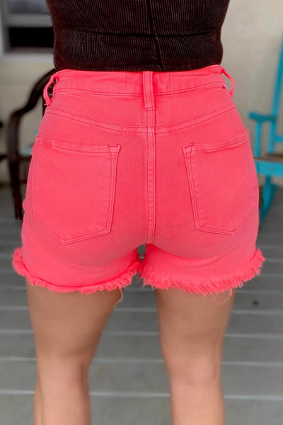 Risen Gabby Asymmetrical Distressed Shorts in Coral Pink