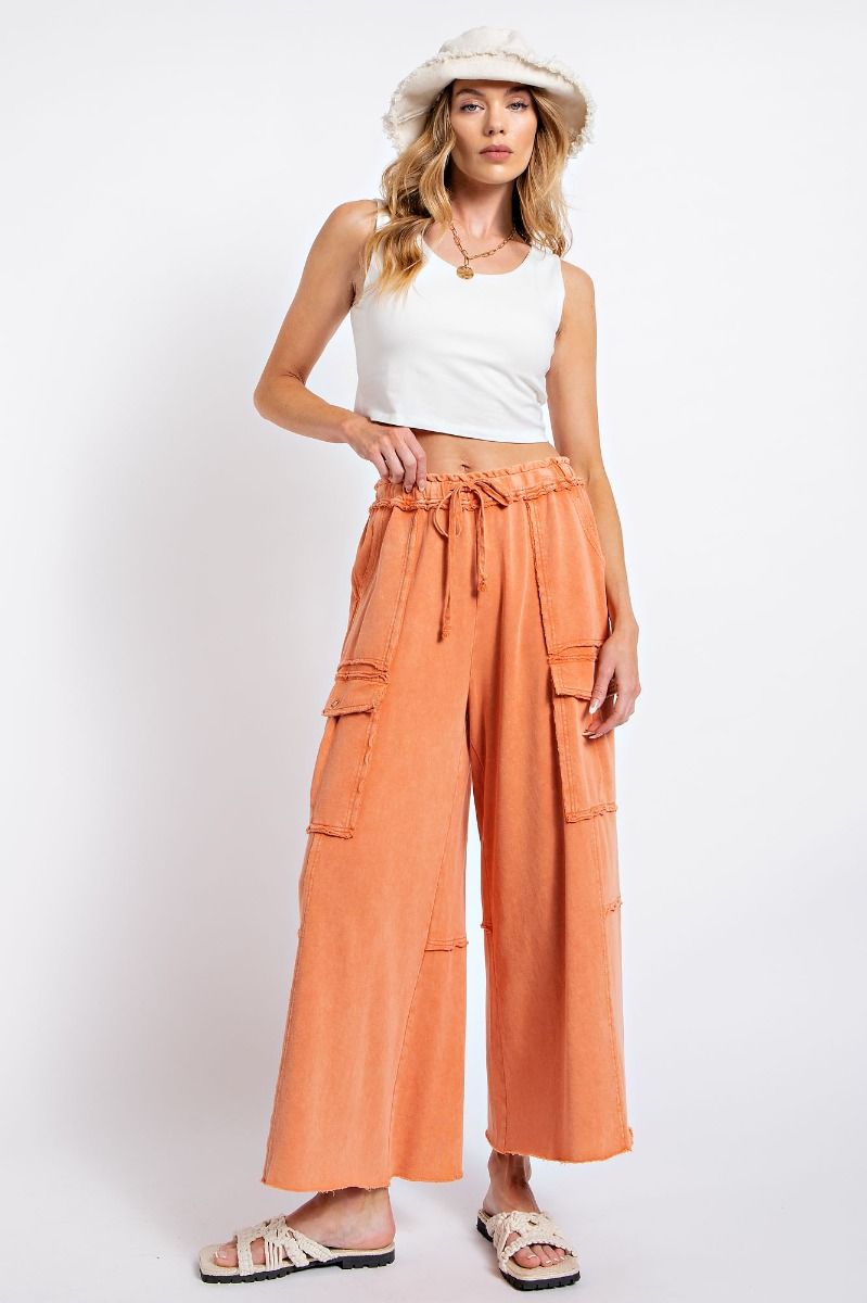 Netflix and Chill Mineral Washed Wide Leg Cargo Pants in Faded Rust